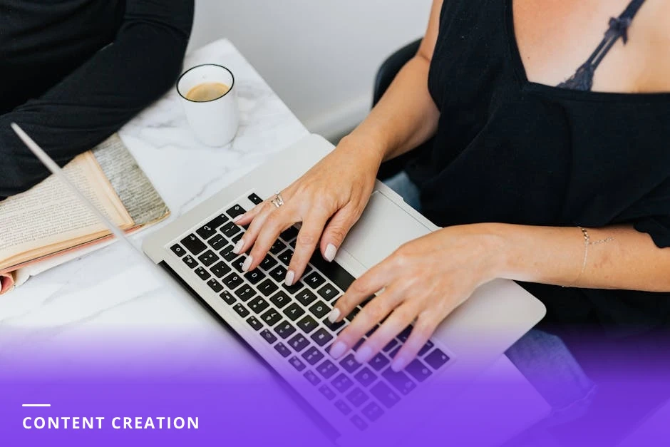 Professional woman typing on a laptop at a tidy home office desk with a notebook and coffee cup, natural light, working on LinkedIn content.