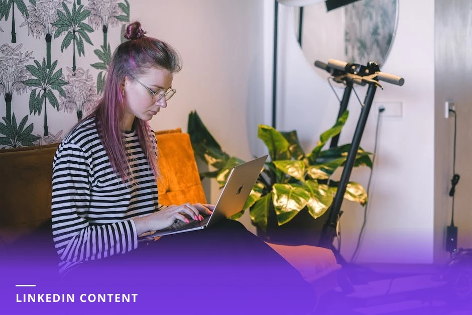A professional coach at a bright Scandinavian-style desk typing on a laptop, smartphone and notebook beside them, soft natural light from a window